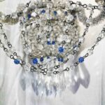 coppia di appliques con perline a due luci d
