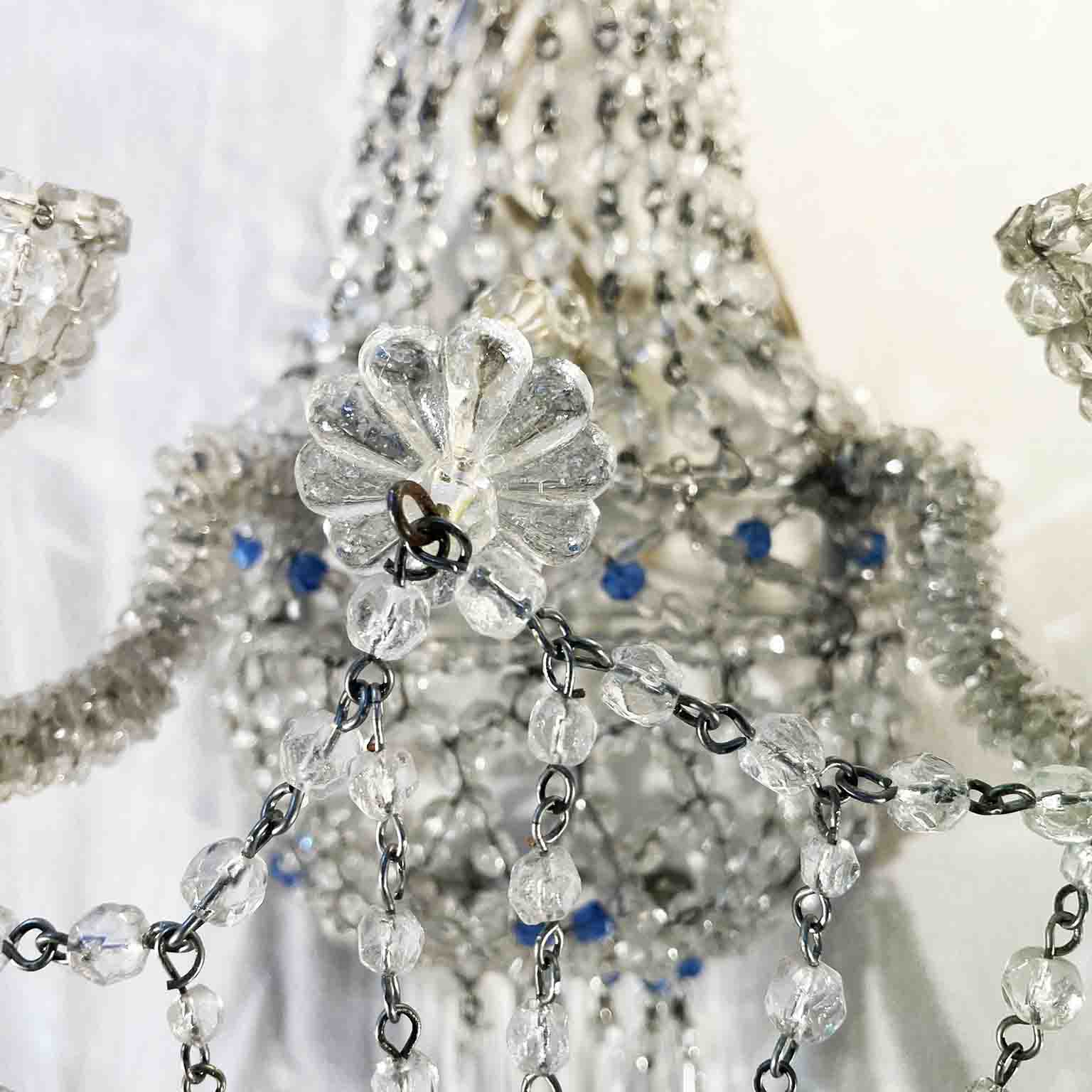coppia di appliques con perline a due luci e