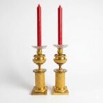 coppia di candelieri impero in bronzo dorato a