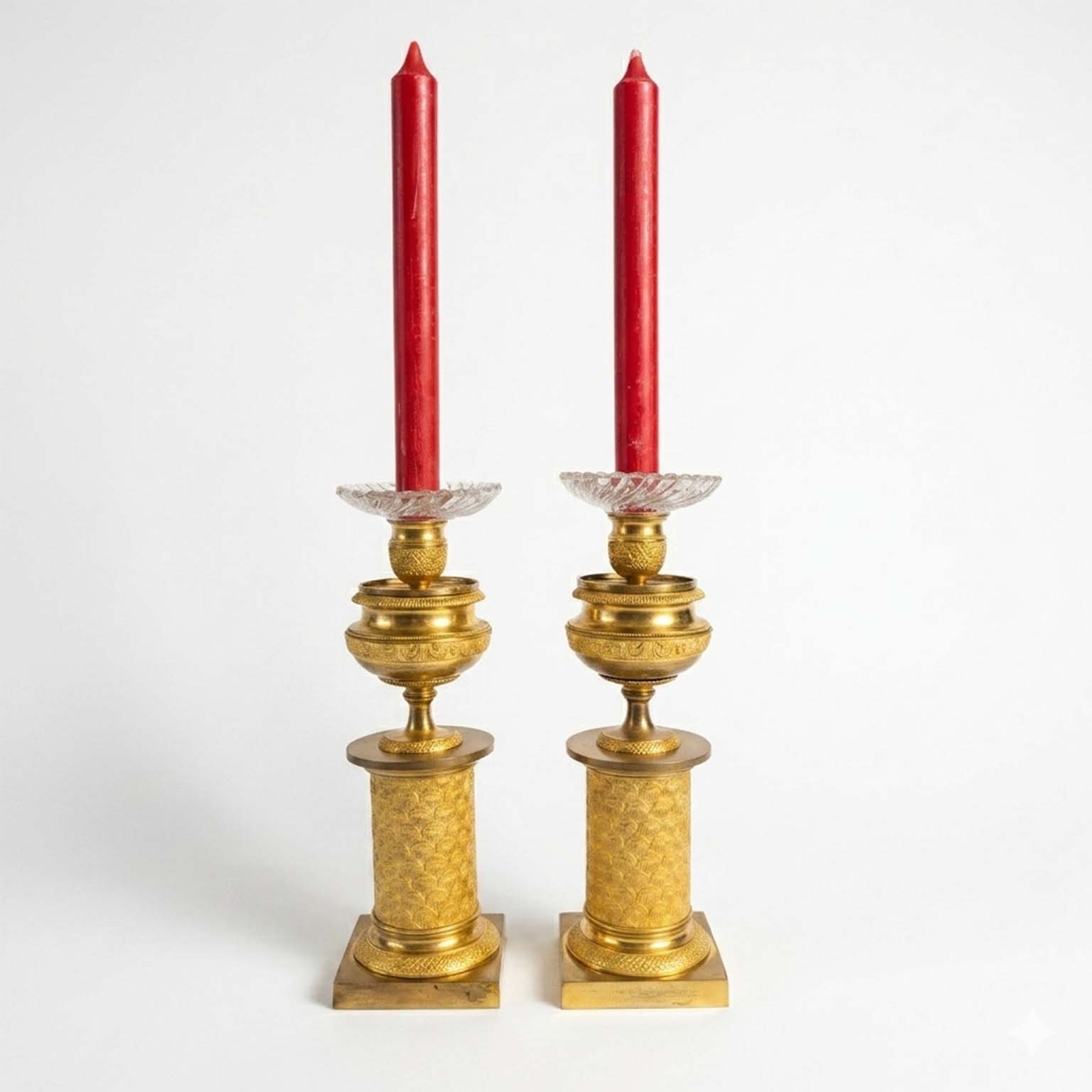 coppia di candelieri impero in bronzo dorato a