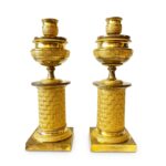 coppia di candelieri impero in bronzo dorato b