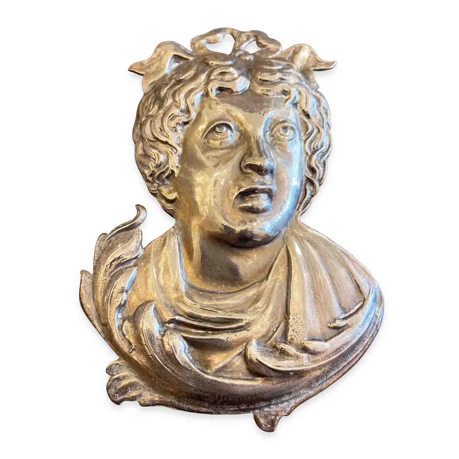 volto in metallo argentato ex voto a